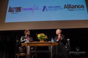 Pearl interviewing Issa Rae...The sponsors for the evening behind them...